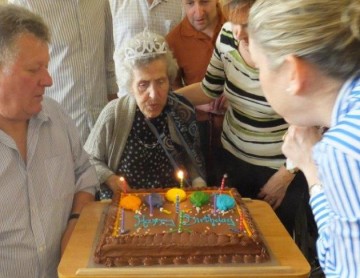 Happy 90th Birthday to a resident at QEP, celebrating with family and friends!