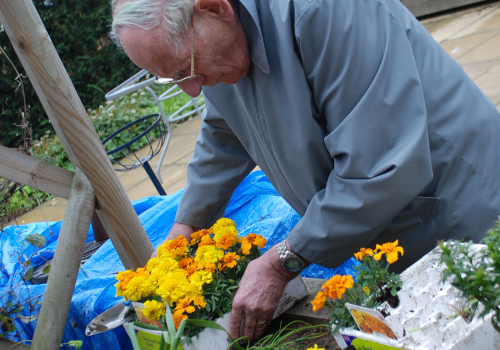 The residents spent the afternoon lovingly planting spring blooms.