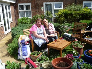 Gardening in the sun at The Spinney